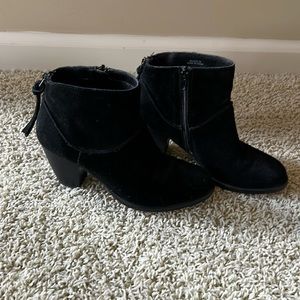 Women’s Steve Madden black suede bootie with a side and back zipper.